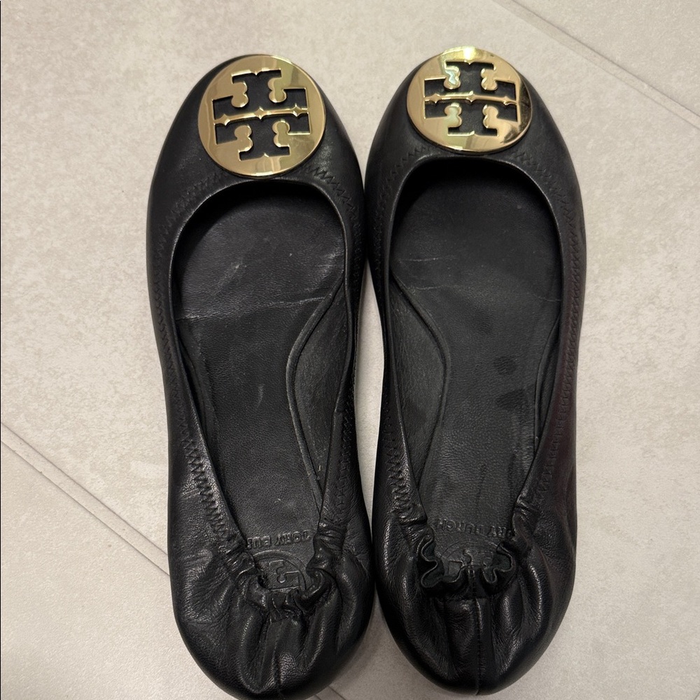 Tory Burch Black Flats with Gold Emblem